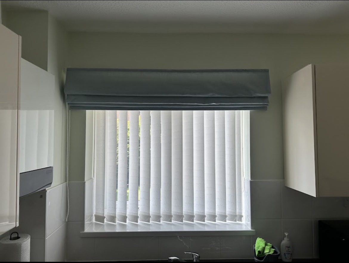 Vertical blinds with a Roman pelmet